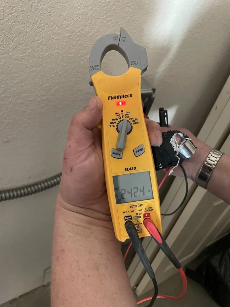 Voltage testing with clamp meter during Hot Tub / Pool Electrical Wiring in Johnstown